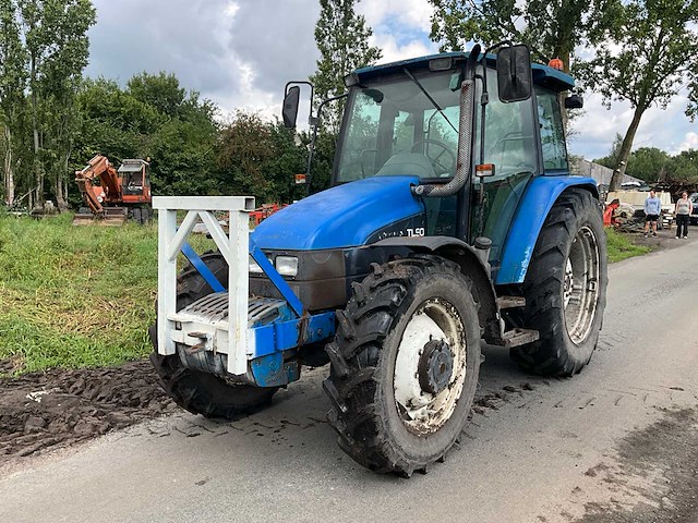 1999 new holland tl90 vierwielaangedreven landbouwtractor - afbeelding 1 van  26