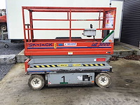 1999 skyjack 3220 luchtwerkplatform - afbeelding 1 van  12