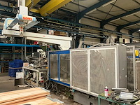 1999 stork sx-n 4400 - 3500 spuitgietmachine met robotarm star - afbeelding 1 van  8