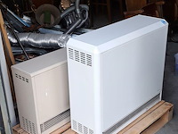 2 elektrische accumulatieradiatoren, werkend - afbeelding 1 van  2