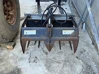 2005 vangaever mestklauw met pieken voor bobcat graafbak klein model - afbeelding 10 van  12