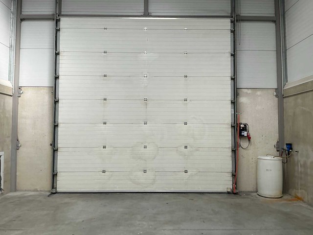 2006 l-door st6 elektrische bediende sectionale poort - afbeelding 2 van  5