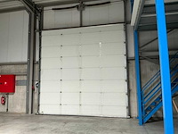 2006 l-door st6 elektrische bediende sectionale poort - afbeelding 1 van  7