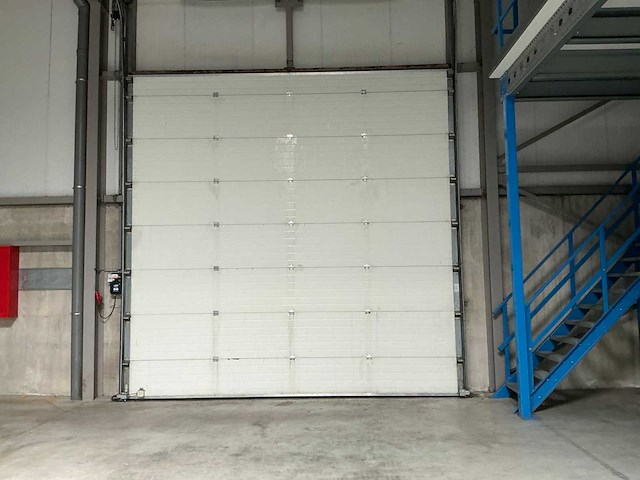 2006 l-door st6 elektrische bediende sectionale poort - afbeelding 2 van  7