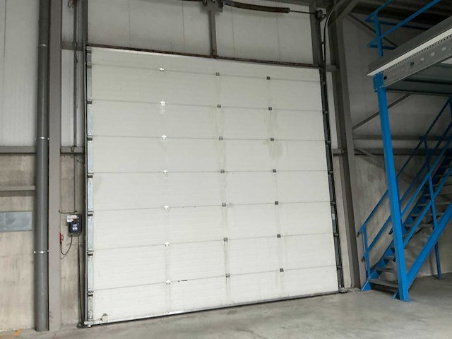 2006 l-door st6 elektrische bediende sectionale poort - afbeelding 3 van  7