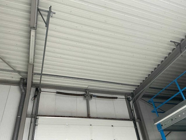 2006 l-door st6 elektrische bediende sectionale poort - afbeelding 5 van  7