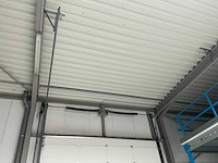 2006 l-door st6 elektrische bediende sectionale poort - afbeelding 5 van  7
