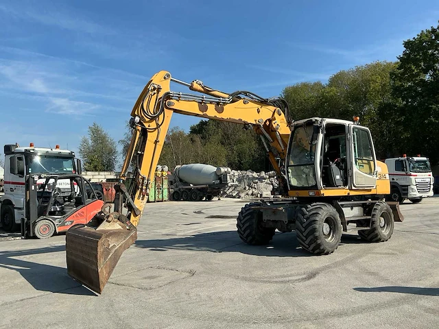 2008 liebherr 314 banden graafmachine - afbeelding 1 van  22