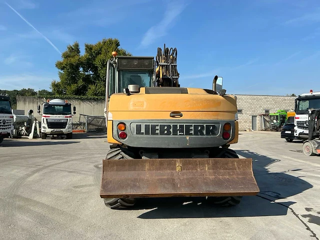 2008 liebherr 314 banden graafmachine - afbeelding 18 van  22