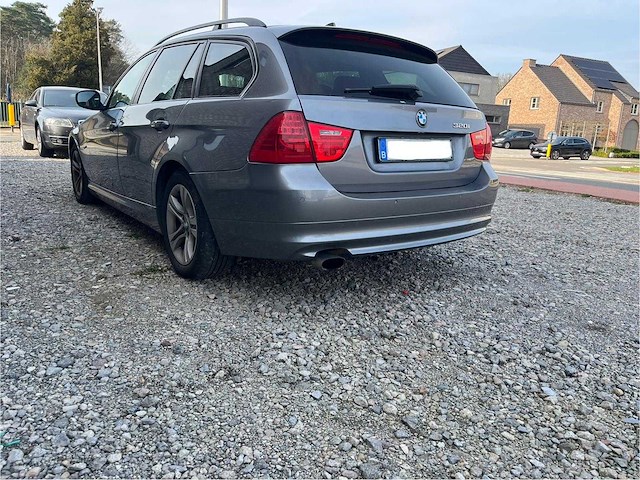 2009 bmw 320i personenauto - afbeelding 4 van  12