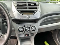 2009 nissan pixo personenauto - afbeelding 13 van  23