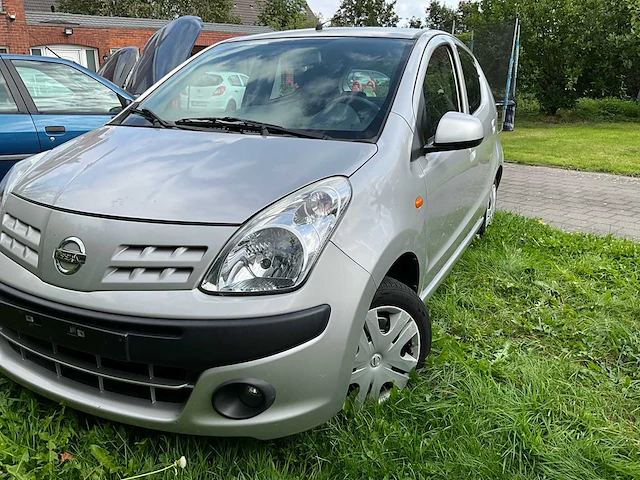 2009 nissan pixo personenauto - afbeelding 1 van  23