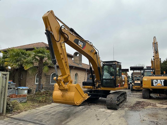 2011 caterpillar 323dl rupsgraafmachine - afbeelding 1 van  26