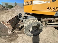 2013 liebherr a 309 litronic wielgraafmachine - afbeelding 8 van  31