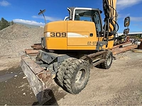 2013 liebherr a 309 litronic wielgraafmachine - afbeelding 26 van  31