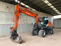 2017 hitachi zx140w-6 banden graafmachine - afbeelding 1 van  32