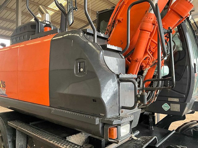 2017 hitachi zx140w-6 banden graafmachine - afbeelding 21 van  32