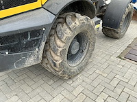 2021 new holland w80c lr wiellader met 2 bakken, palletvork en ap-leveler - afbeelding 15 van  49