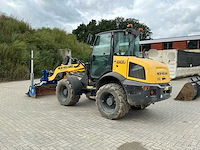 2021 new holland w80c lr wiellader met 2 bakken, palletvork en ap-leveler - afbeelding 23 van  49