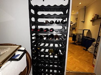 3 div wijnrekjes met div flessen wijn - afbeelding 1 van  10