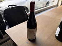 3 flessen rode wijn parallele 45