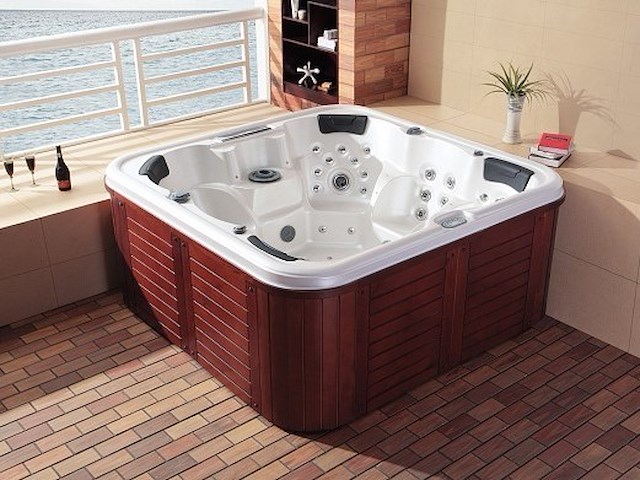 5 persoons outdoor spa 208x208 cm incl. 2 ligbedden - wit bad / mahonie kleur zijkant - afbeelding 1 van  21