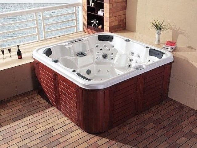 5 persoons outdoor spa 208x208 cm incl. 2 ligbedden - wit bad / mahonie kleur zijkant - afbeelding 1 van  20