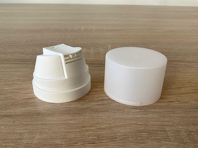 53mm actuator iron matt white+overcap trans.white overige verpakkingsmaterialen (2934x) - afbeelding 1 van  4