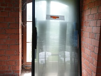 7x pivoterende stalen deur met glas - afbeelding 2 van  3