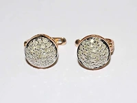 9 kt geelgouden oorbel met 0,82 cts natuurlijke diamant