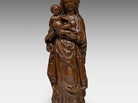 A 16thc flemish oak sculpture of the madonna holding the child 36 cm. (14.16 in.)