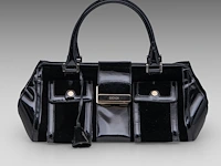 A black escada handbag in velvet and lacquer 17 x 40 x 15 cm. (6.69 x 15 3/4 x 5.91 in.)
