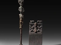 A bronze tribal sceptre from mali and a carved wooden comb with fertility symbols, d.r. congo, h 39 cm (tallest)