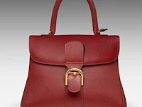 A burgundy red delvaux brillant mm handbag 22 x 29 x 15 cm. (8.66 x 11.41 x 5.91 in.)