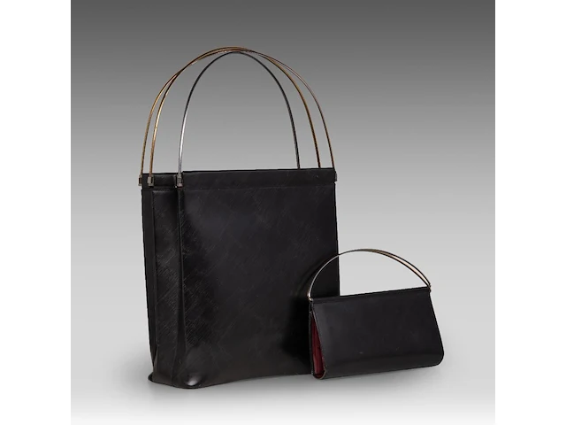A cartier black 'trinity' top handle bag and a 'trinity' wallet - afbeelding 1 van  13