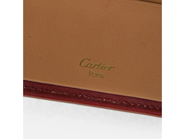 A cartier burgundy 'trinity' top handle bag, wallet and two 'must de cartier' wallets - afbeelding 6 van  16