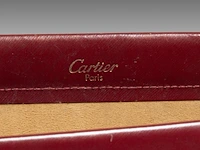 A cartier burgundy 'trinity' top handle bag, wallet and two 'must de cartier' wallets - afbeelding 8 van  16