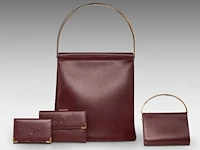 A cartier burgundy 'trinity' top handle bag, wallet and two 'must de cartier' wallets - afbeelding 10 van  16