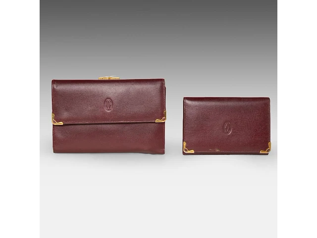A cartier burgundy 'trinity' top handle bag, wallet and two 'must de cartier' wallets - afbeelding 14 van  16