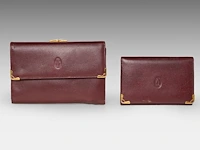 A cartier burgundy 'trinity' top handle bag, wallet and two 'must de cartier' wallets - afbeelding 14 van  16