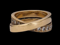 A cartier 'paris nouvelle vague' crossover ring, 18ct yellow gold and diamonds, 17,7 g (+)