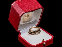 A cartier 'paris nouvelle vague' crossover ring, 18ct yellow gold and diamonds, 17,7 g (+) - afbeelding 19 van  20