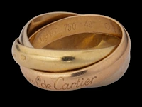 A cartier trinity 'les must de cartier' ring in 18ct tricolour gold, weight: 6,6 g (+)