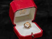 A cartier trinity 'les must de cartier' ring in 18ct tricolour gold, weight: 6,6 g (+) - afbeelding 12 van  12