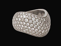 A cartier 'wave' 18ct white gold ring and diamonds, weight: 18,1 g (+)