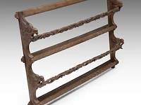 A carved oak wall hanging plate rack or shelf, late 19thc 66 x 107 cm. (25.98 x 42.13 in.)