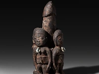 A carved wooden fon fertility statue, benin, early 20thc 30 x 12.5 cm. (11.81 x 4.91 in.)