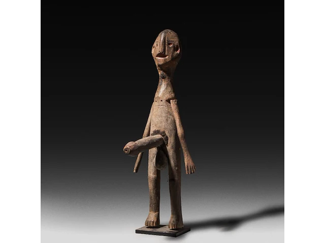 A carved wooden tribal puppet with an erection, zunu people, d.r. congo 58.5 cm. (23.03 in.) - afbeelding 1 van  5