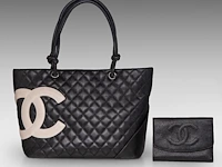 A chanel 'cambon ligne' tote bag and a chanel 'caviar' wallet