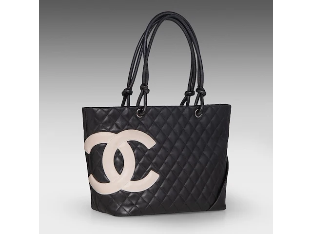 A chanel 'cambon ligne' tote bag and a chanel 'caviar' wallet - afbeelding 13 van  17